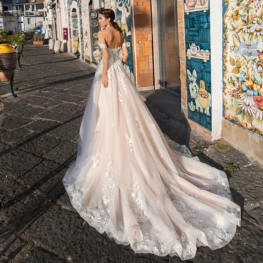 Romantic Radiance: Enchanting Off-the-Shoulder A-line Wedding Dress in Tulle with Exquisite Lace Appliques