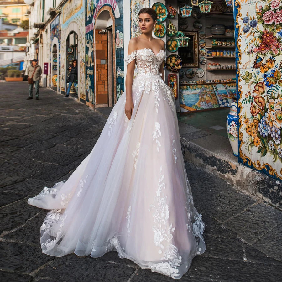 Romantic Radiance: Enchanting Off-the-Shoulder A-line Wedding Dress in Tulle with Exquisite Lace Appliques